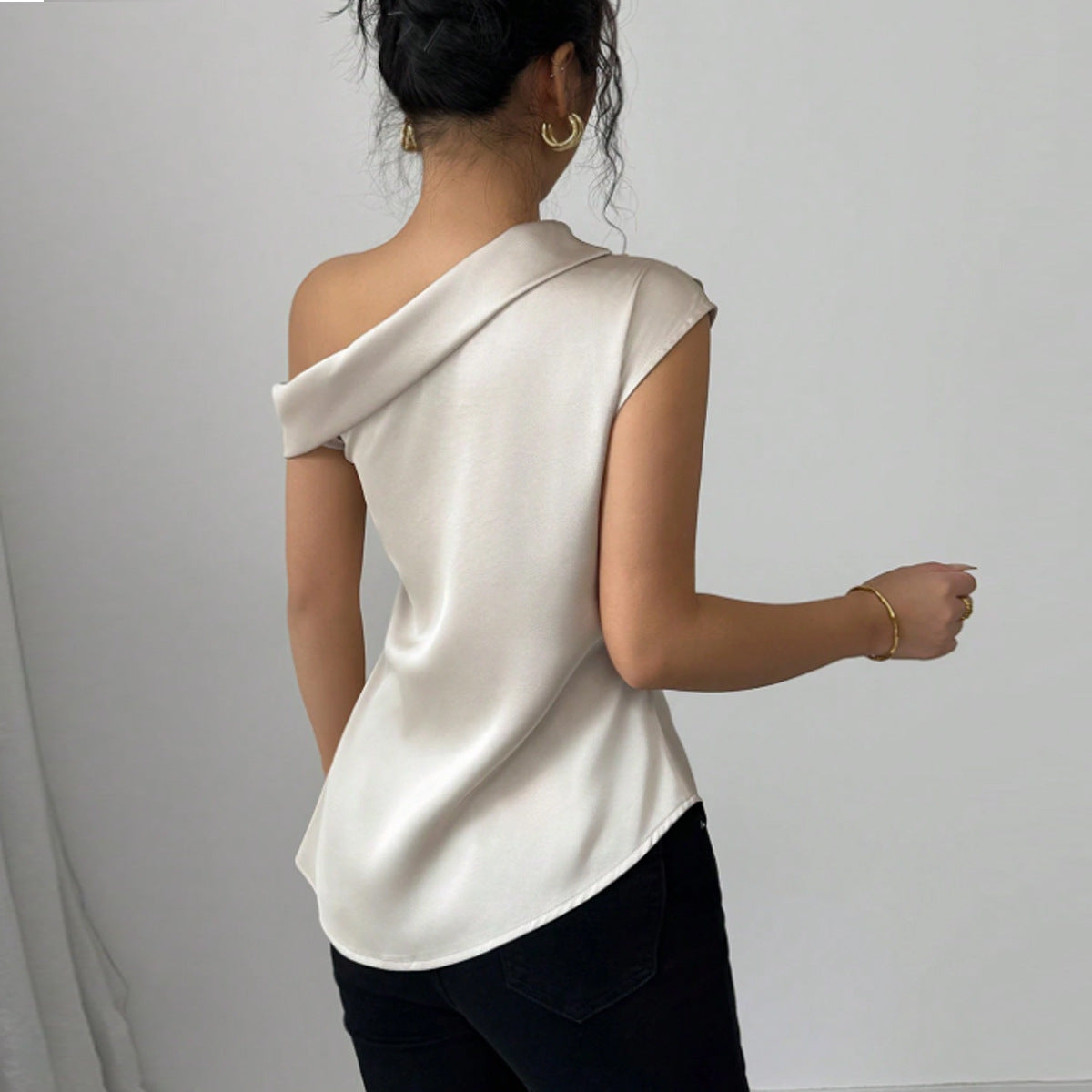 Irregular sloping shoulder top for women