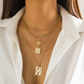 Ins personality niche metal chain layered necklace with sweet and cool snake skin pattern geometric pendant necklace for women